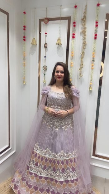 BREATHTAKING GOWN IN A SOFT LAVENDER HUE ON NET