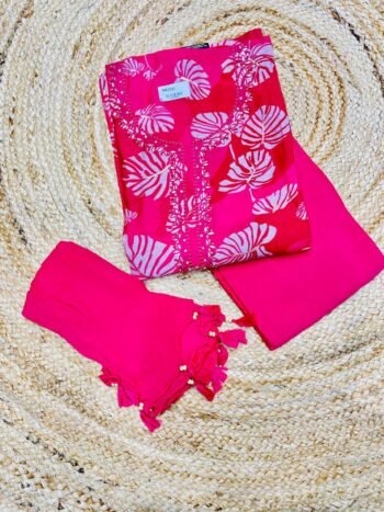 Three Vibrant Pieces of Cloth In Bold Pink And Red Tones.