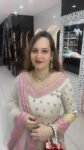 A three piece set in pure dola silk with intricate handwork and detailing