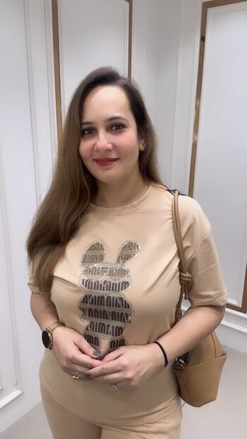 A beige co-ord set, which is a matching two-piece outfit