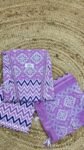 pure cotton fabric suit set featuring a vibrant purple base with intricate white and blue traditional and geometric patterns