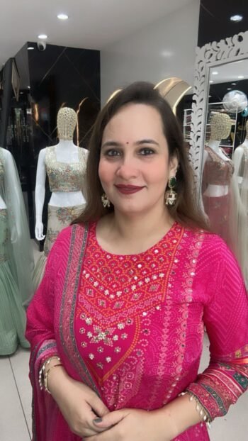 A beautiful hot pink C-cut suit made from pure crepe silk with cotton lining