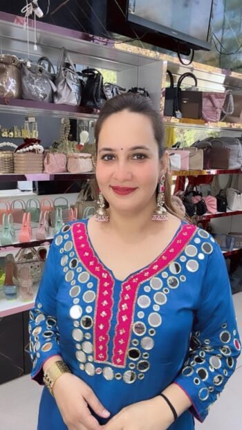 The blue suit is a traditional Indian ethnic wear set