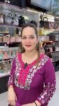 The wine  suit is a traditional Indian ethnic wear set,